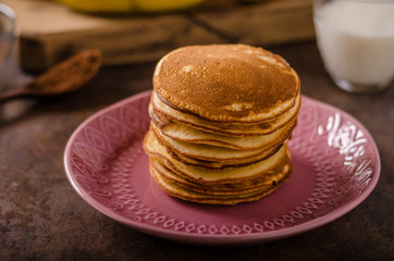 American pancakes with banana, chocolate