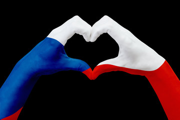 Obraz premium Hands flag of Czech republic, shape a heart. Concept of country symbol, isolated on black.