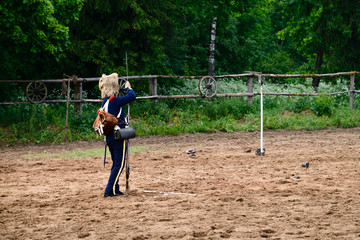 Obraz premium cavalryman shooting