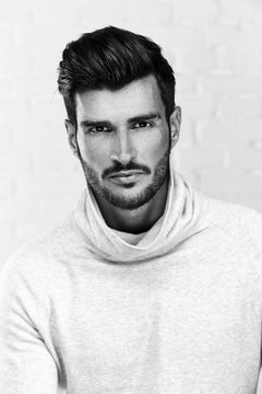 Black and white portrait photo of handsome man