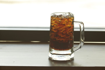 iced cola glass on the table