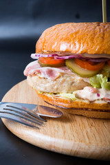 Beef burger on wooden board