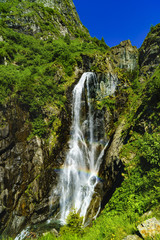 Fototapeta na wymiar Beautiful waterfall in the mountains of Fagaras Romania