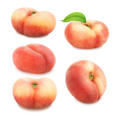 Set of flat peaches isolated on white.