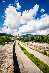 Fototapeta na wymiar ancient medieval bridge and village Bobbio - italian landscape Emilia Romagna Italy