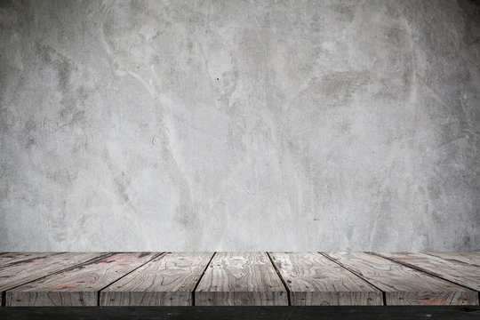 Empty Wood Shelf On Concrete Wall Background