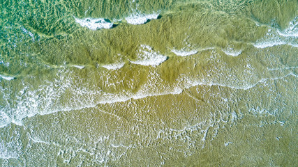 Surf on a sunny beach. Auckland, New Zealand