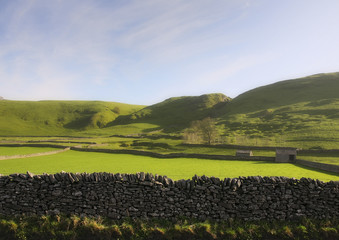 Fototapeta na wymiar Landscape of the fields farms in the Peek District in England