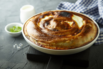 Pie with potato and herbs or Burek pie