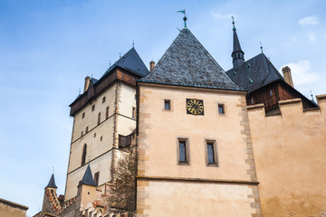 Obraz premium Karlstejn castle towers under blue sky