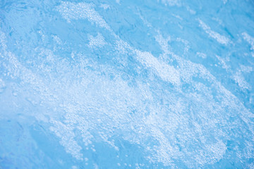 Blue clear fresh Water in jacuzzi. Spa massage background.