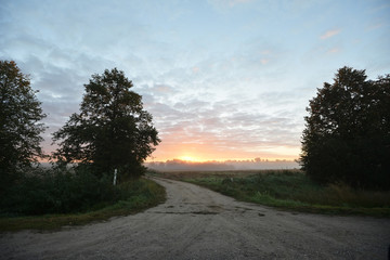 sunrise in fields.