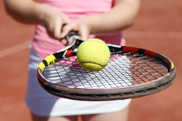 Tennisrack och boll