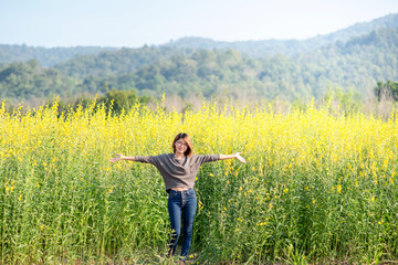 Portrait of beauty woman in the Meadow.Portrait of young beautiful smiling woman outdoors.