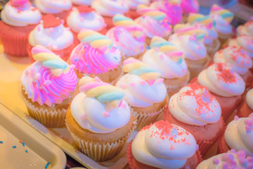 Colorful cupcakes with beautiful buttercream frosting decoration and Sweetest  .