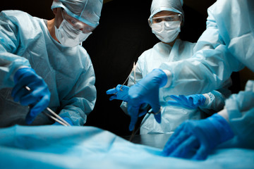 Image of doctors with instruments