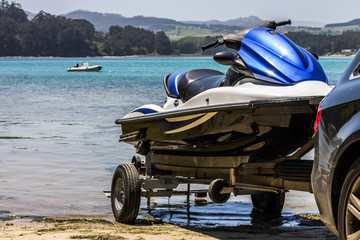 A jet ski about to be unloaded to sail