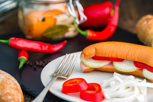 Traditional Czech sausages  in vinegar with onion