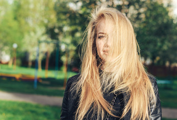 Naklejka premium Beautiful girl on windy day