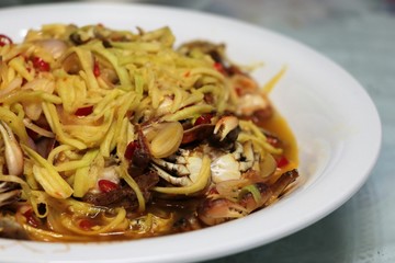 Crab salad with pickled asian food spicy and sours on  plate