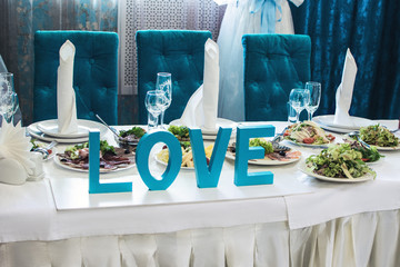 Wedding banquet in a restaurant in turquoise colors