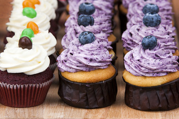 Delicious cupcakes with berries