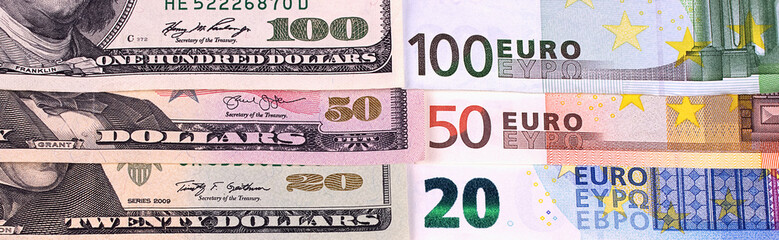 Money background american dollars and euro different denominations.