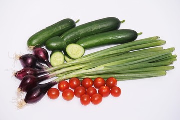 Fresh organic vegetables on white background