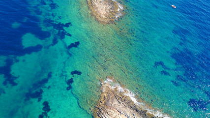 Aerial drone photo of Hamolia area with turquoise colored clear water rocky beaches, Porto Rafti, Mesogeia, Attica, Greece
