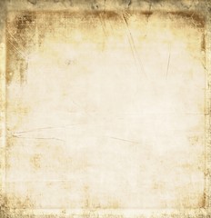 Vintage fabric texture background in sepia tones.