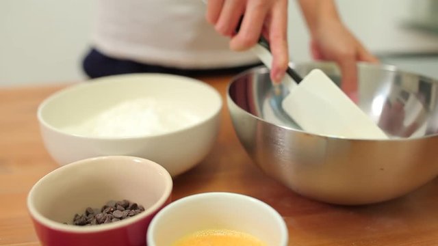 Woman making chocolate cookies