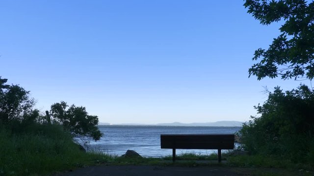 4K Empty Beach Bench, Blue Sky and Sea Horizon View, Ocean Coastal Water Beauty
