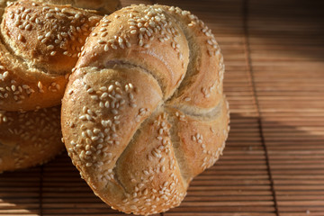Bread buns with sesame seeds, close up