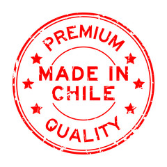 Grunge red premium quality made in chile round rubber stamp on white background