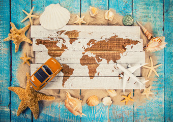 Summer traveling time. Sea holiday background with various shells.