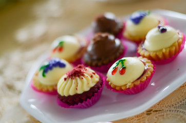 a beautiful cupcake in a white plate