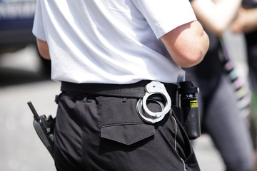 Policeman with handcuffs