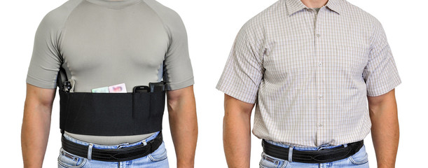 Torso of a man dressed in civilian clothes, underneath the shirt there is a set for concealed carry...