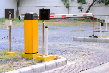 Automatic rising arm access barrier of buiding car park.