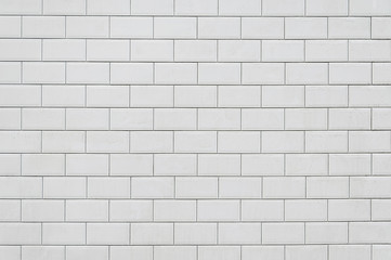 Old white tile brick wall background texture - 162534345
