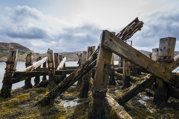 Fototapeta na wymiar Old Jetty with Sea in Scotland