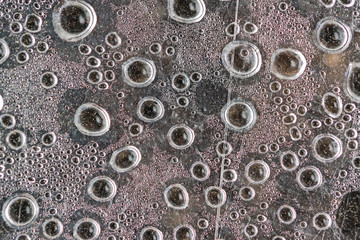 Abstract background of water drops on a plastic surface on the inside in the form of steamy droplets