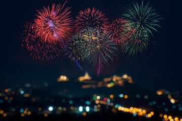 Fototapeta na wymiar Beautiful firework display on celebration night, showing on the river 