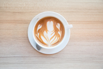 Cup of coffee with beautiful Latte art.how to make latte art coffee