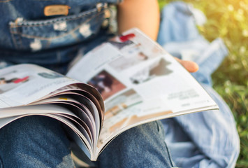 reading a magazine blur