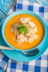 Tomato soup with rice.