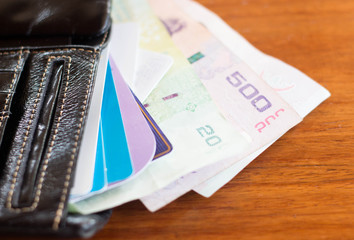 purse with money, credit and debit cards