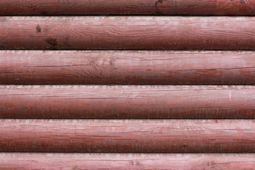 wall of Russian national wooden house. background texture of logs