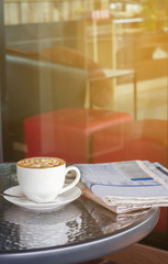 Coffee and newspaper