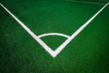 Obraz premium Corner(White stripe) on the green soccer field - background